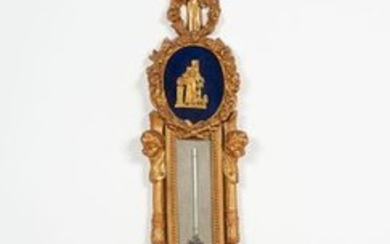 Important barometer thermometer in chiselled gilt bronze, circular...