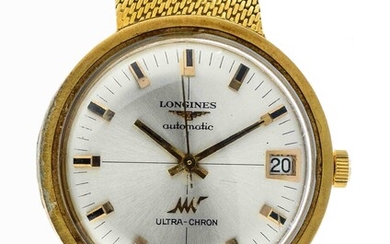 LONGINES - Montre "Ultra-Chron"en or - Cadran argenté à index - Date par guichet à...