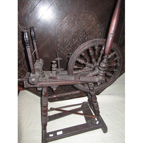 Late C18th turned wooden spinning wheel, loose ring turned b...