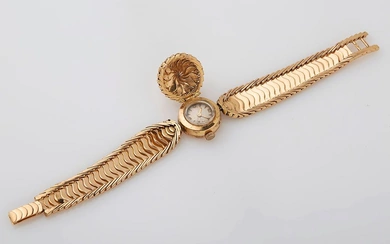 Montre bracelet de femme en or jaune (18 K) ou maille souple articulée. Long. :...
