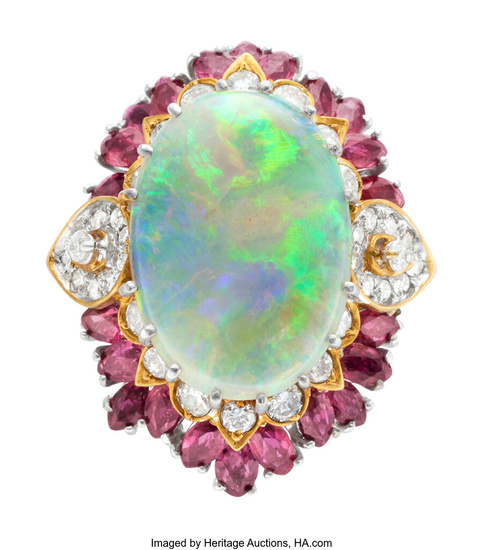Opal, Diamond, Ruby, Gold Ring Stones: Opal cabochon; marquise-shaped...