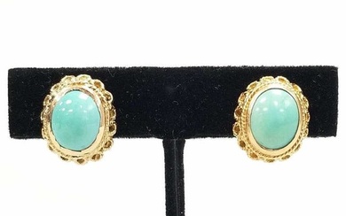 Pair of 18K gold clip earrings set with oval cabochon turquoise - robin's egg blue with rope design