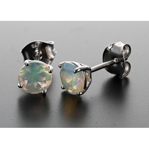 Pair of modern 9ct white gold opal stud earrings, 2.00ct app...