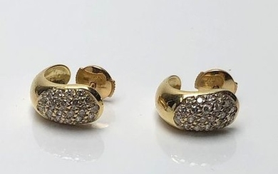 Pair of yellow gold earrings paved with 48...