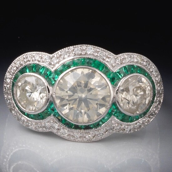 Platinum, Three Diamond and Emerald Ring