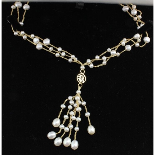 Seed pearl necklace with 14ct gold clasp and central Chinese...