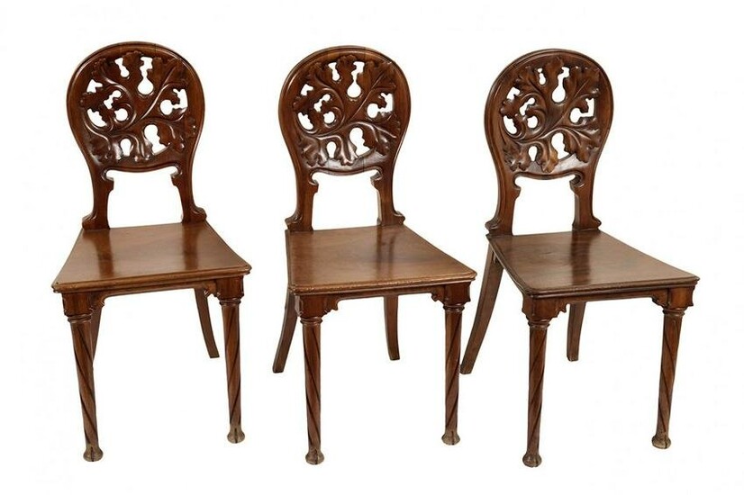 Set of three modernist chairs, circa 1900. Walnut wood.