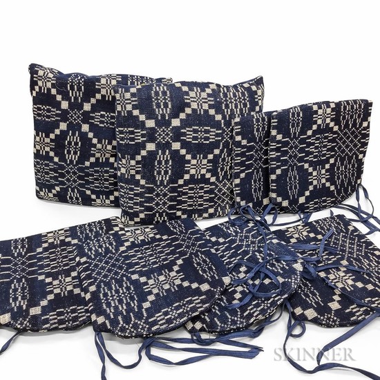 Seven Blue and White Woven Coverlet Seat Cushions and Pillows, Pennsylvania, c. 1830-40.