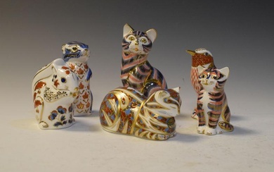 Six Royal Crown Derby porcelain paperweights to include cats,...