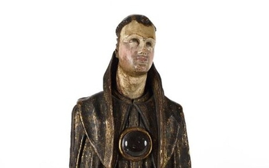 Spain 18th century Probably a Saint Franciscan Bust reliquary in polychrome wood with estofado decorations. Height 38 cm. Resting on a polychrome wooden base bearing an inscription (H. 10 cm.)