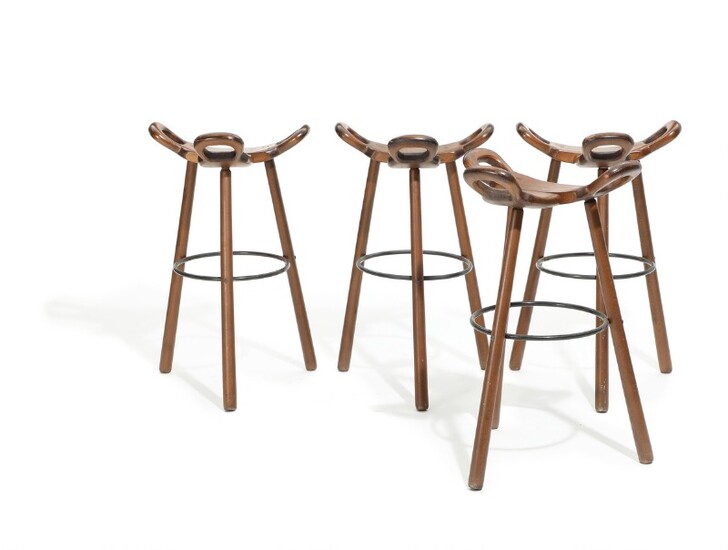 Spanish design: “Marbella”. Set of four patinated solid beech bar chairs, three-legged frame and saddle shaped seat. H. 75 cm. (4)