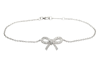 TIFFANY & CO, bracelet bow, platine, diamants taille brillant 0,12 ctw, longueur 15,5 cm, poids...