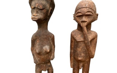 TWO AFRICAN GHANA CARVED WOODEN FERTILITY FIGURES Male and f...