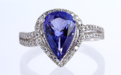 Tanzanite and diamond ring in 14 kt. white gold