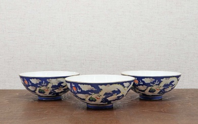Three Chinese blue-ground white-enamelled bowls