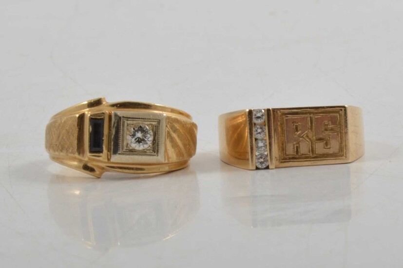 Two gentleman's signet rings set with diamonds.