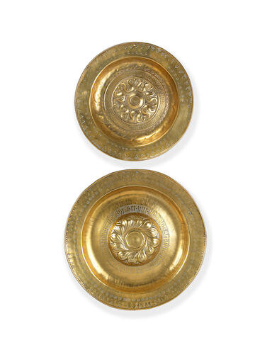 Two late 16th century Nuremberg repousse brass alms dishes