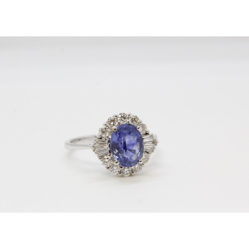 18ct white gold and sapphire diamond cluster ring. Sapphire ...