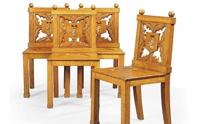 A SET OF FOUR REGENCY GOTHIC OAK HALL CHAIRS, FIRST QUARTER 19TH CENTURY, AFTER THE DESIGN BY GEORGE SMITH