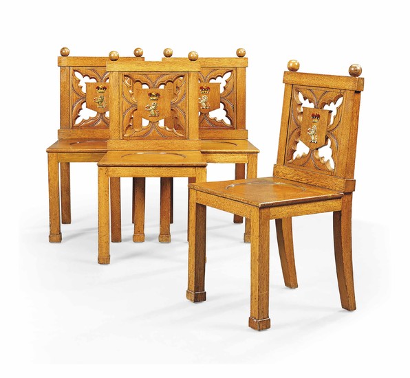 A SET OF FOUR REGENCY GOTHIC OAK HALL CHAIRS, FIRST QUARTER 19TH CENTURY, AFTER THE DESIGN BY GEORGE SMITH