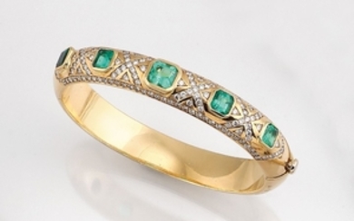 18 kt gold bangle with emeralds and...