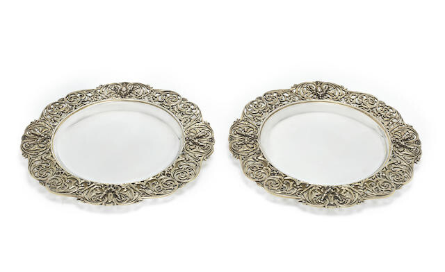 A pair of silver-gilt dishes