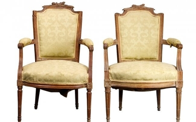 A pair of Louis XVI style upholstered fruitwood