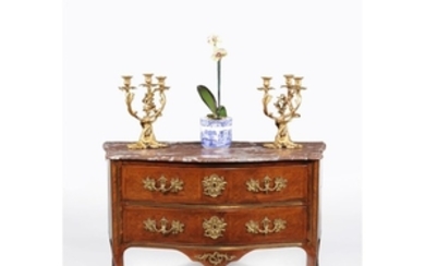 A Louis XV/XVI transitional tulipwood and kingwood serpentine commode