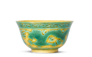 A YELLOW-GROUND GREEN-ENAMELLED ‘DRAGON’ BOWL, GUANGXU SIX-CHARACTER MARK IN UNDERGALZE BLUE AND OF THE PERIOD (1875-1908)
