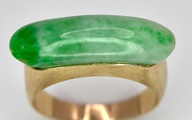 A 14K Yellow Gold Jade Ring. 1.8cm jade. Size...