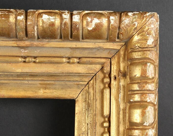 A 19th Century Carved Giltwood Frame. 30" x 23"