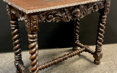 A 19th century Jacobean style carved oak centre table, over-...