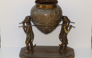 A 19thC Lankan bronze censer being carried by monkeys,...