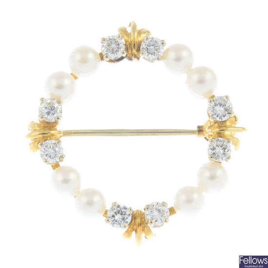 A 9ct gold diamond and cultured pearl brooch.