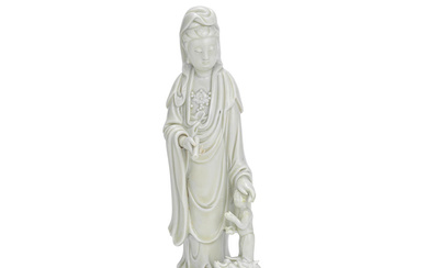A BLANC-DE-CHINE 'GUANYIN AND A CHILD' GROUP 17th/18th century