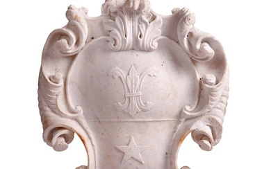 A CARVED WHITE MARBLE CARTOUCHE OR SHIELD, POSSIBLY FRENCH, MID 18TH CENTURY