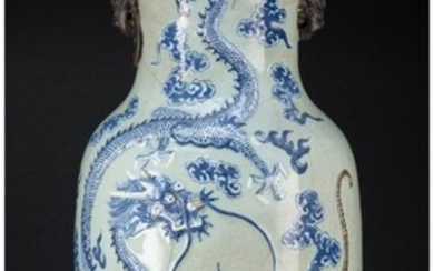 A Chinese Celadon Ground Dragon and Tiger Vase