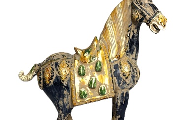 A Chinese Tang style horse, 20th century, glazed pottery, decorated in colours, 68cm high