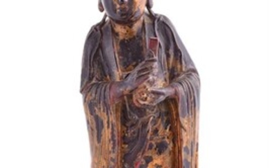 A Chinese carved wooden temple figure of Guanyin