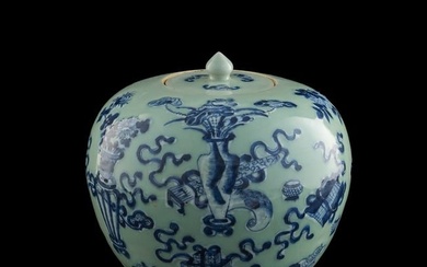 A Chinese celadon-ground blue and white lidded jar, early 19th century