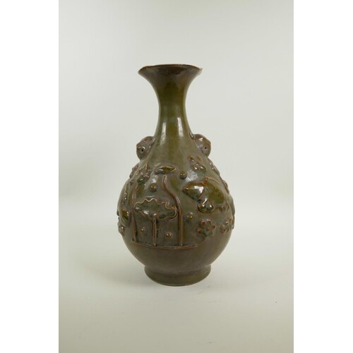 A Chinese olive and brown glazed pottery pear shaped vase wi...