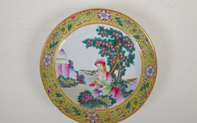 A Chinese polychrome porcelain dish decorated with a western...