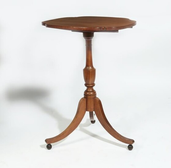 A Federal cherry tilt-top candle stand