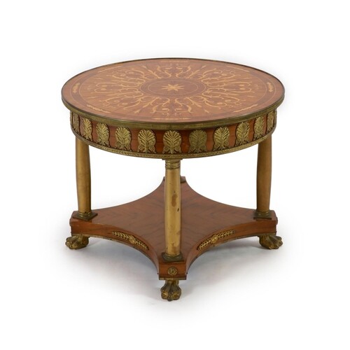 A French empire style ormolu mounted marquetry centre table ...