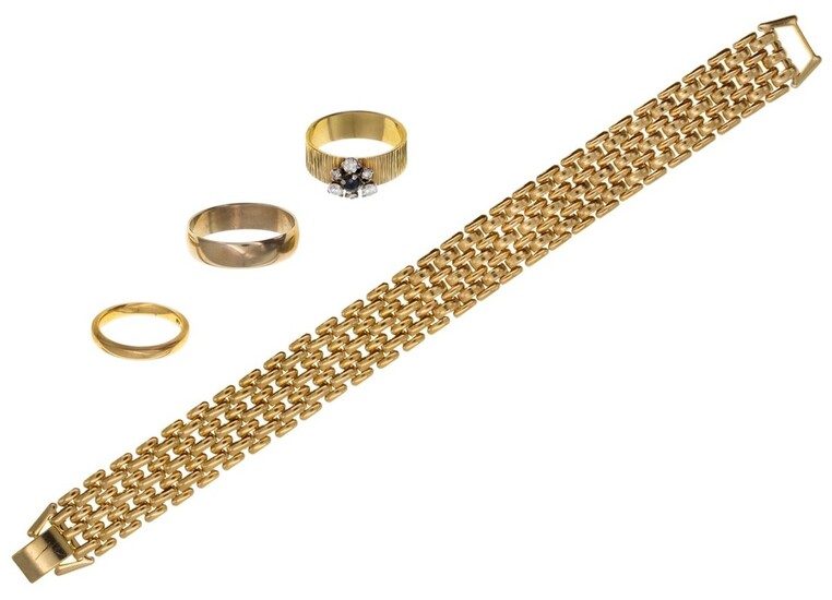 A Group of Jewelry An 18 carat reeded gold band set with a central sapphire and a cluster of di...