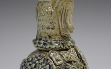 A Jennie Hale studio pottery salt glazed pot and cover, 1980s, modelled as a grotesque bird in a sui