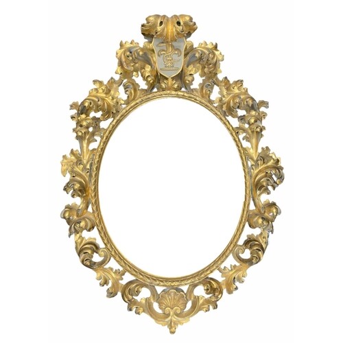 A LARGE 19TH CENTURY ITALIAN CARVED GILTWOOD FLORENTINE OVAL...