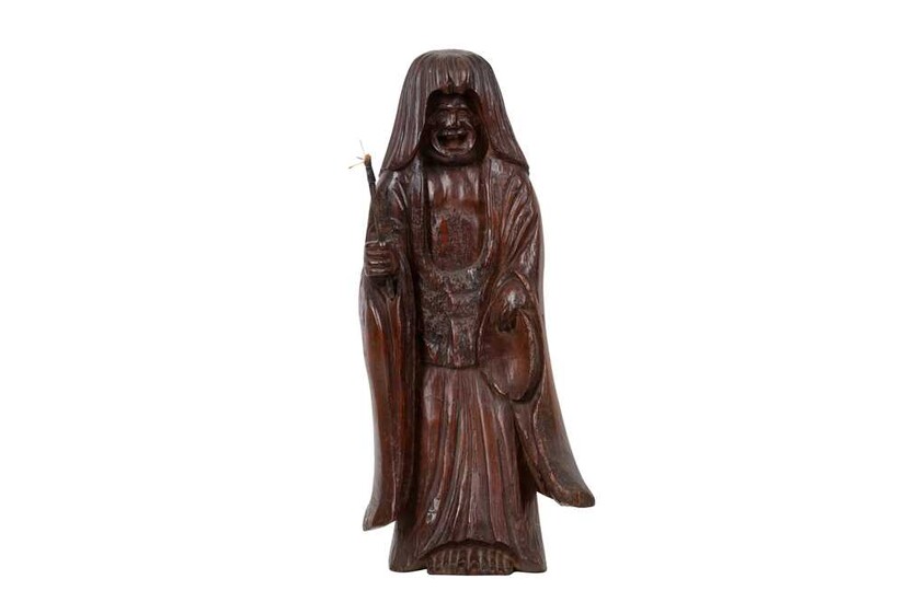 A LATE 19TH / EARLY 20TH CENTURY JAPANESE CARVED WOODEN FIGURE OF A SHOJO
