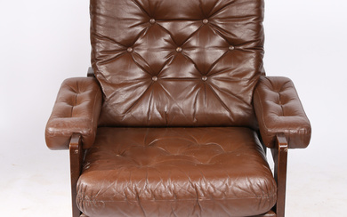 A MID TO LATE 20TH CENTURY DANISH STYLE ARMCHAIR.