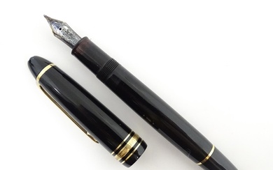 A Mont Blanc Meisterstuck 146 fountain pen, with black barre...